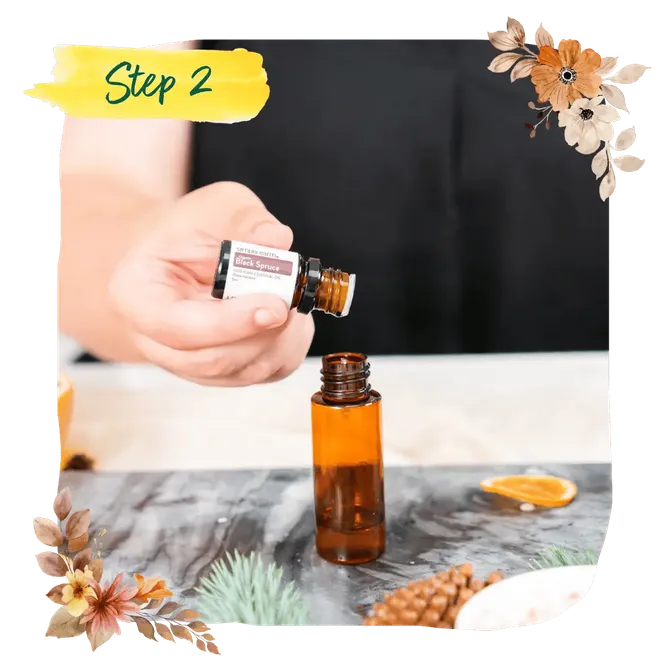 Step 2 — a maker dripping essential oil from its bottle into an amber bottle